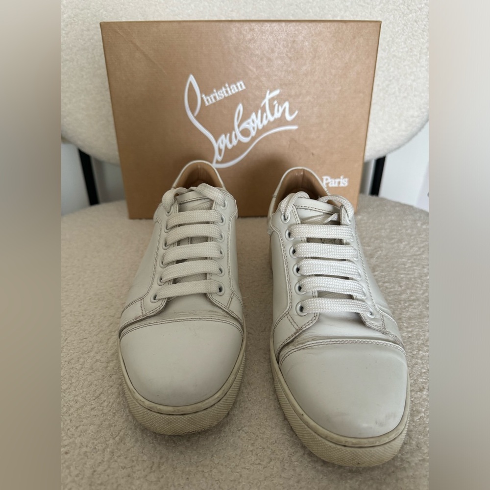 White Louboutin sneakers